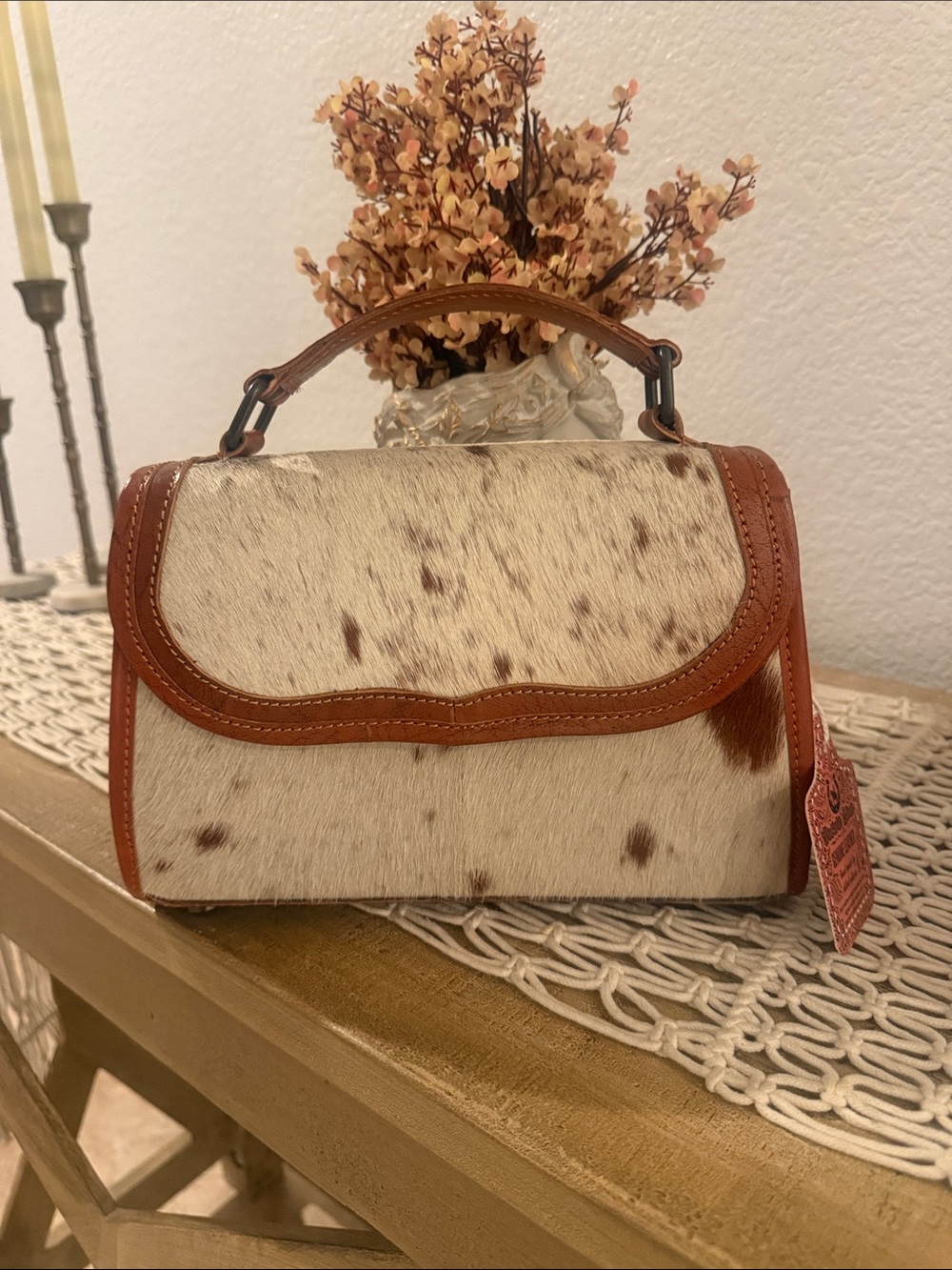 Rustic Luxe Cowhide Top Handle Crossbody Bag
Way - Picture 2 of 5